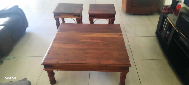 1 x 122cm x121cm coffee table and 2x 61cm x 61cm side tables heavy solid wood price negotiable