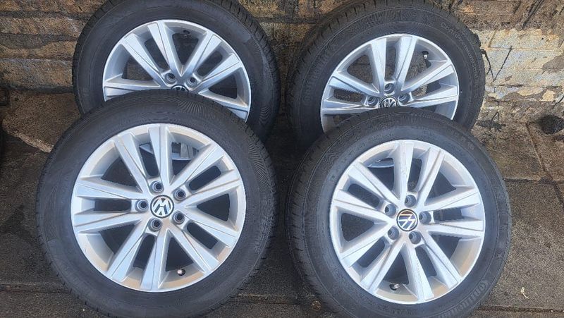 185/60R15 Polo mags and tires for sale. leave your whatsapp number interested.