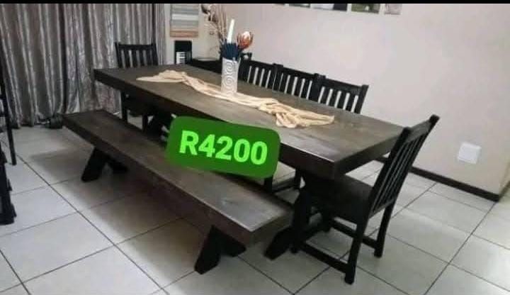 8 seater dinning table and chairs available