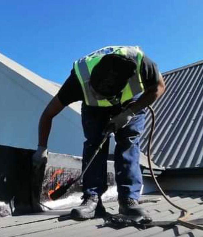 Torch on waterproof roof repair