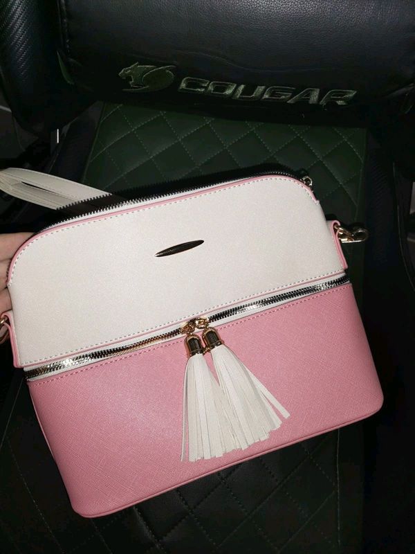 Pink and white handbag