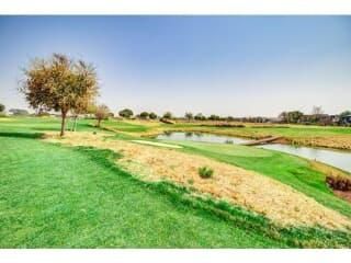 Vacant land facing golf course and lakes