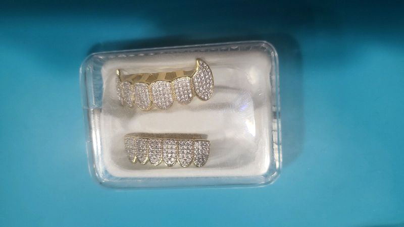 Grilz hip hop top and bottom complete iced out