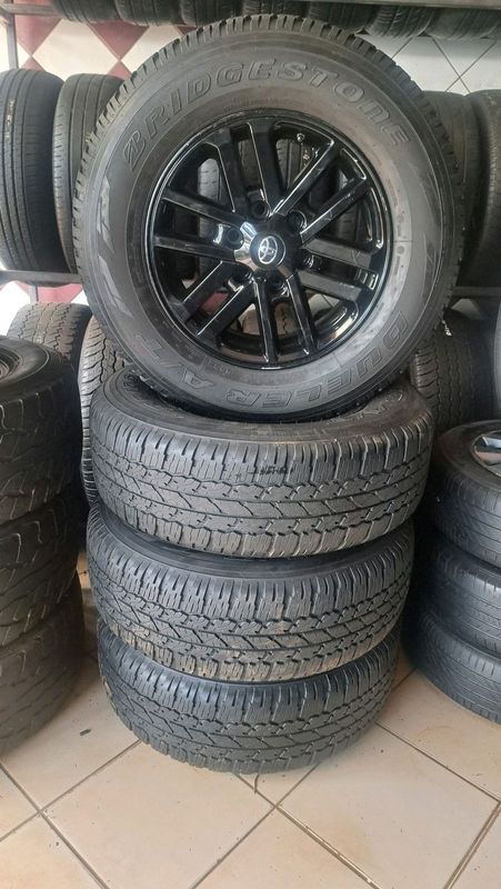 17 inch toyota hilux mags with 265 65 r17 Bridgestone tires.