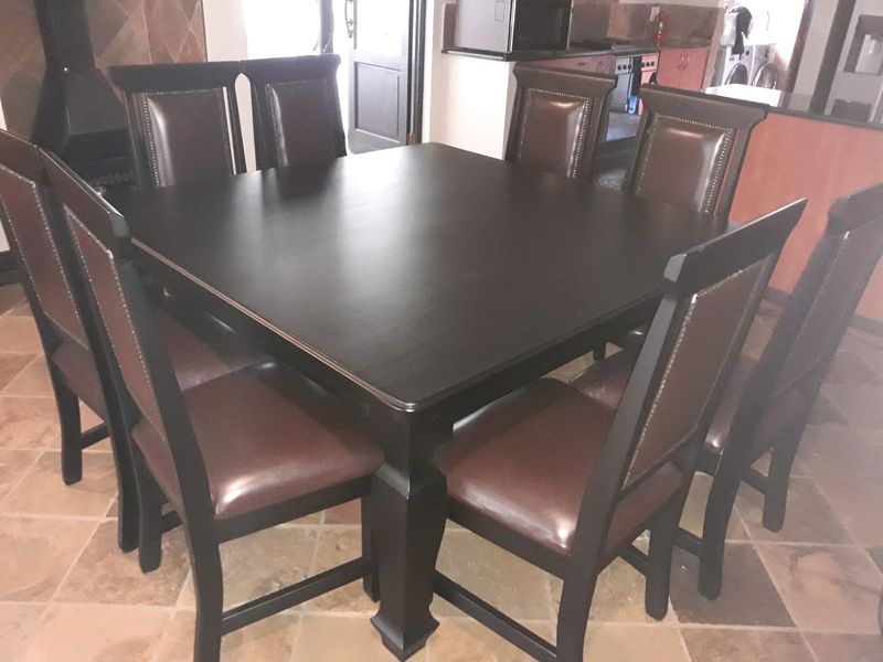 Wooden 8 seater Dining room table and chairs