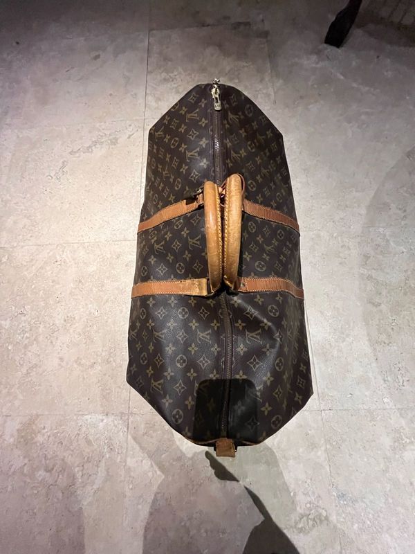 Louis Vuitton Duffle Bag R10000