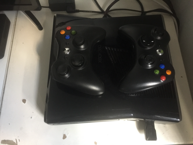 Xbox 360 comes with all cables and 2 wireless controllers and 2 games