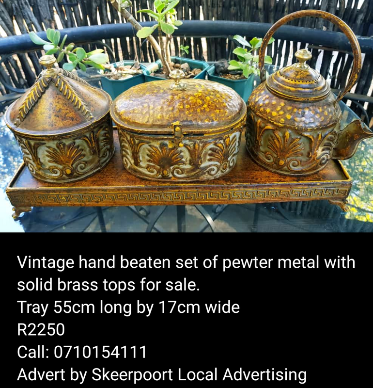 Vintage hand beaten set of pewter metal with brass tops for sale.