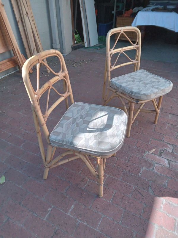 Pair of bamboo chairs for sale.