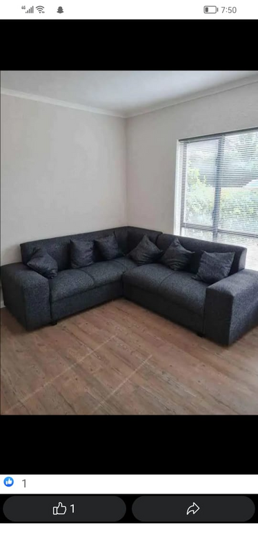 Dark grey L shape couch