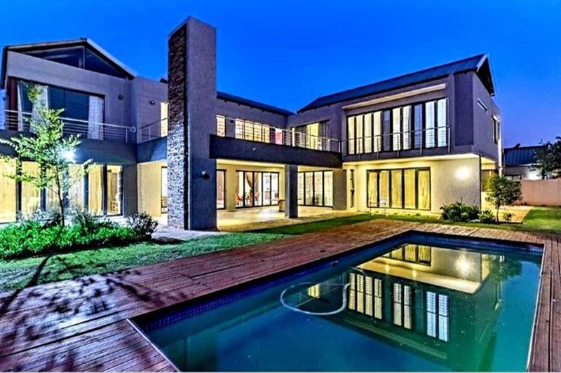 Indulge in the Splendor of Serengeti Golf Estate with this Remarkable Contemporary Residence