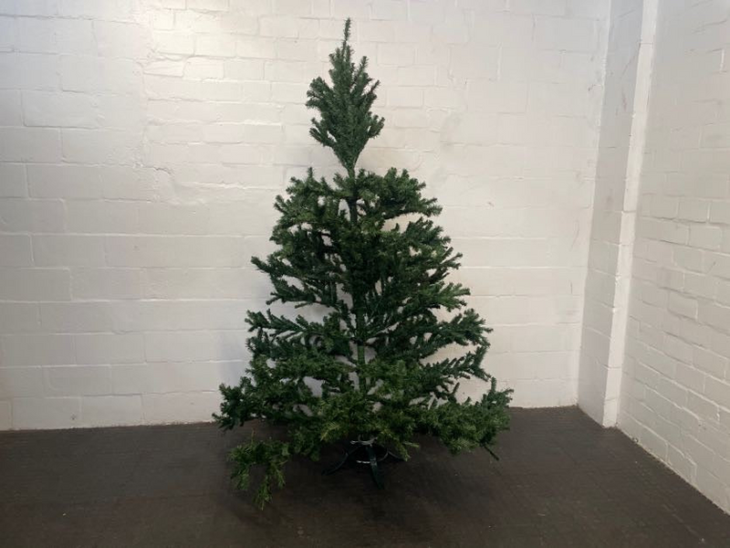 Christmas Tree On Green Stand-