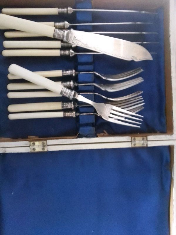 Vintage boxed set of fish knives and forks. EPNS set of six of each.