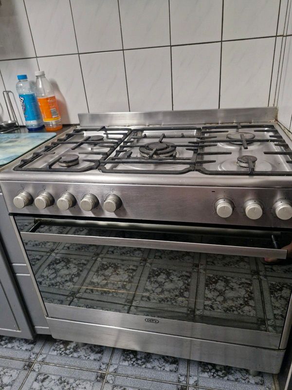 Defy 5 burner gas top with electric oven