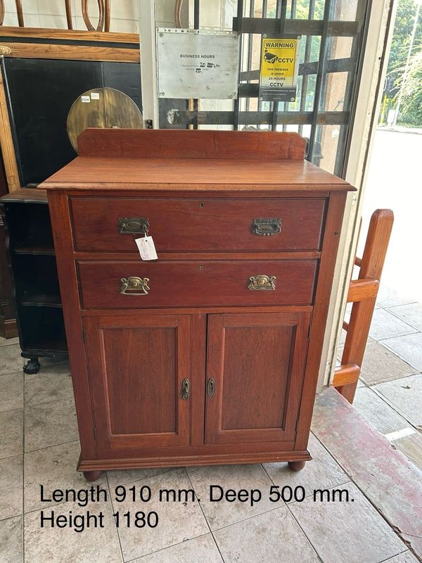 Tall teakwood cabinet with 2 drawers and 2 doors