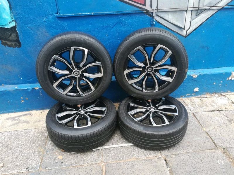 A set of 16inch original Renault clio mags rim 4x100 PCD with tyres also fit 4 holes KIA Rio/ Toyota