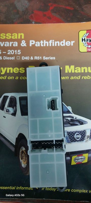 Nissan Navara &amp; Pathfinder 2005 - 2015 Haynes repair manual and Navara R/H side window switch