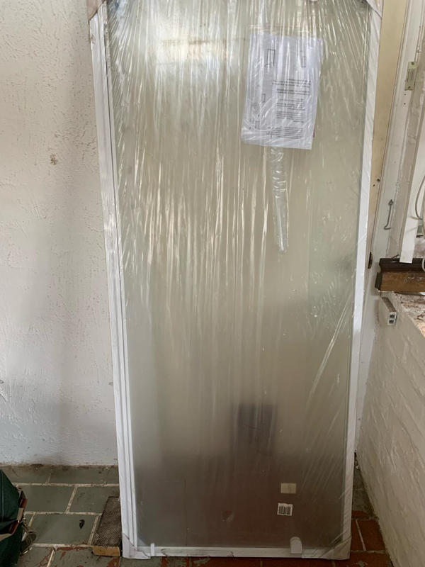 Single tempered glass shower door, brand new, still in factory wrapping