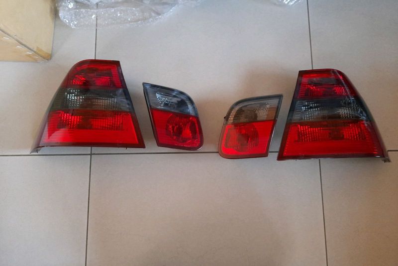 BMW E46  1999/05  BRAND NEW  CRYSTAL BLACK TYPE  TAILIGHTS SET FORSALE PRICE:R3250