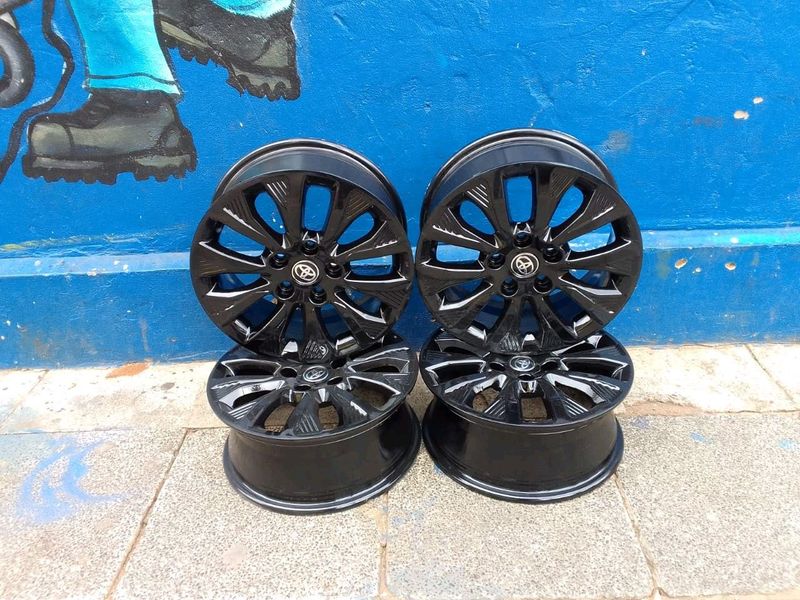 A set of 16inches original Toyota urban cruiser mags rim 5x114.3 PCD also fit Toyota corolla as well