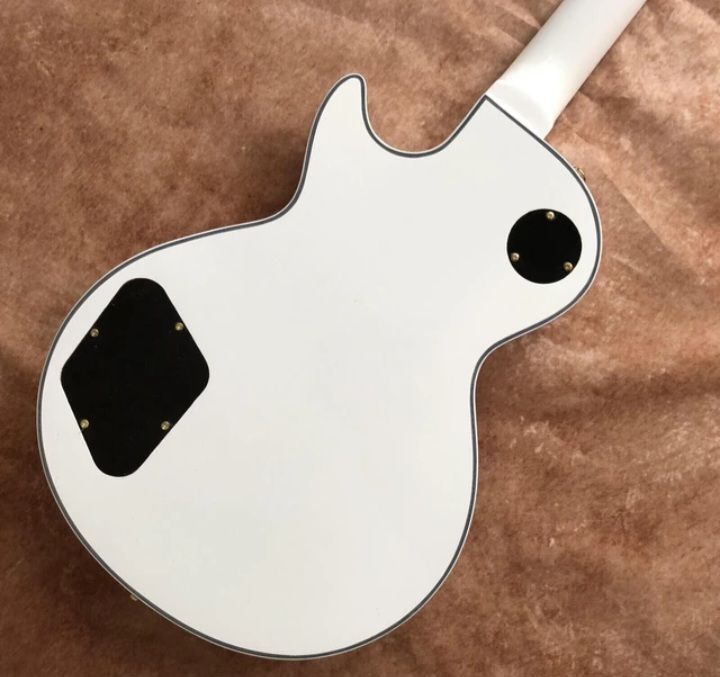 White custom guitar gold