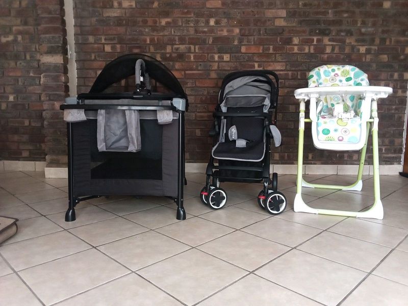 Camp cot, stroller and feeding chair