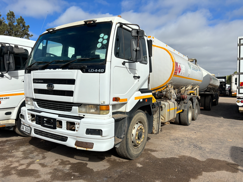 2008 Nissan UD440 6x4 rigid fuel tanker with 2016 Tank Clinic tri axle drawbar tanker trailer