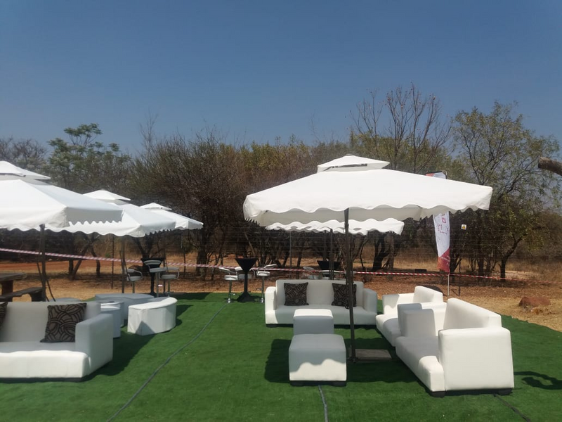 Hire garden umbrellas and white couches, Chillas set up decor, Party decor and graduations.