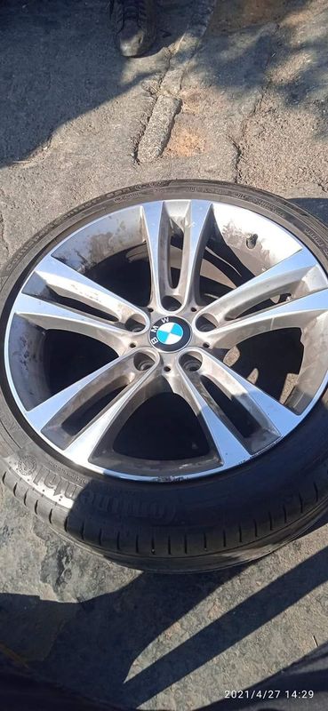 Single b m w 18 inch mag with a tyre r2500