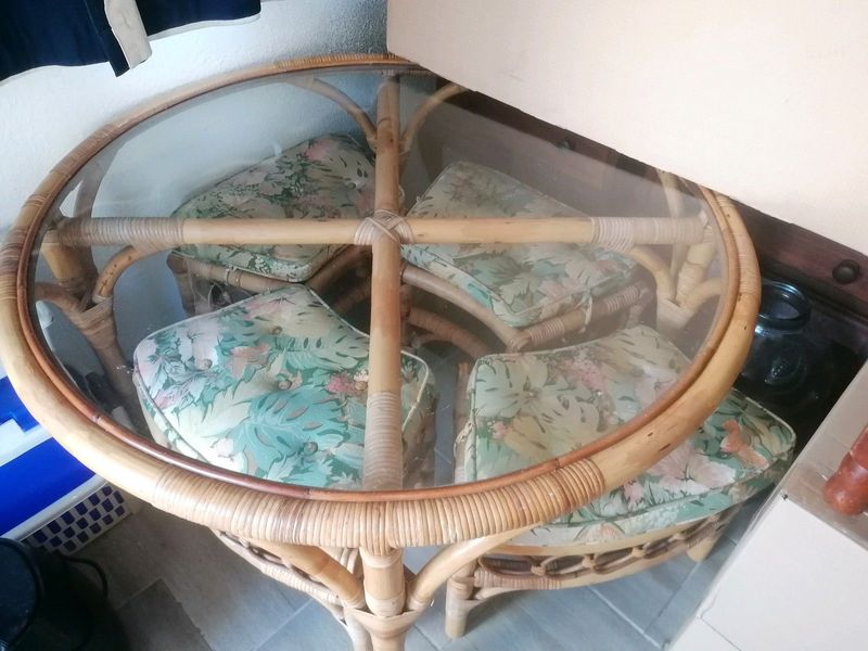 Cane round glass coffee table with 4 chairs