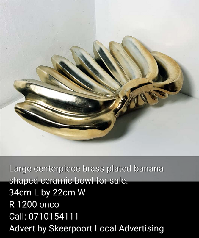 Large centerpiece brass plated banana shaped ceramic bowl for sale.