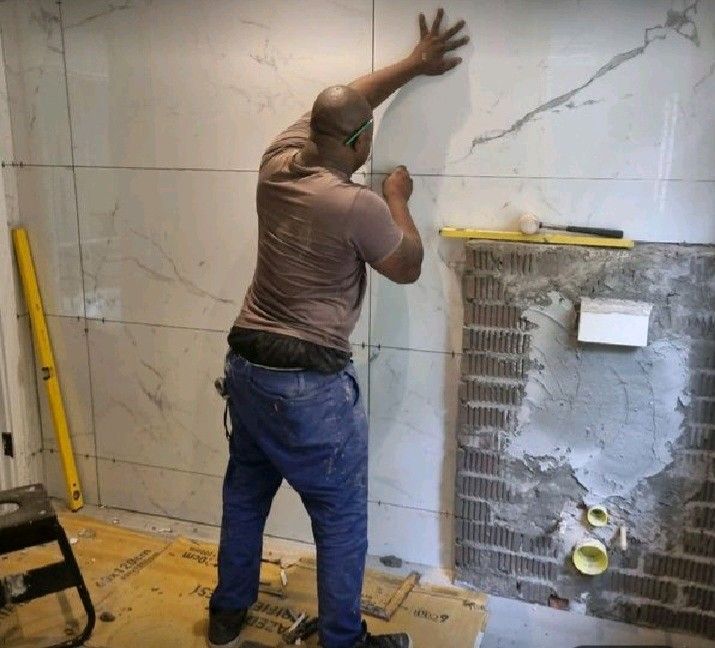 Tiling and plumbing.