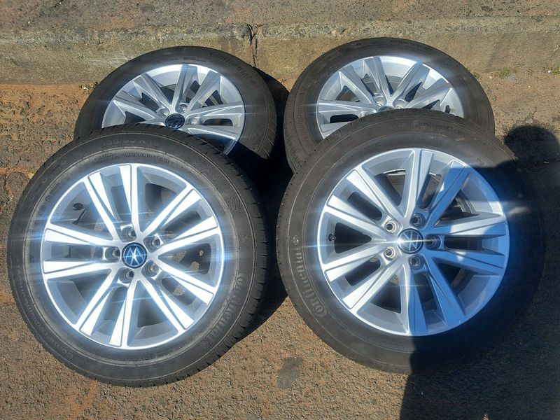 15 inch polo mags with 185 60 r15 continental tires of 98% thread left.