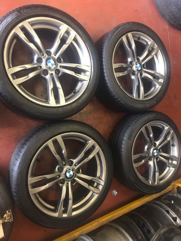 18 inch Bmw rims original oem with run flat tyres  never been repaired before