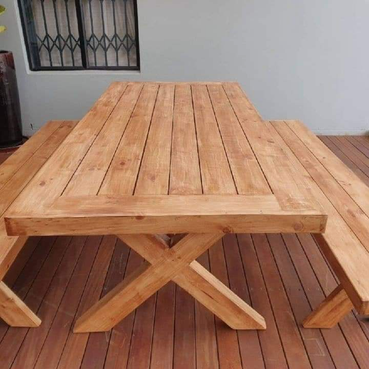 NEATLY CRAFTED INDOOR AND OUTDOOR CROSSSED LEGGED TABLE AND BENCHES