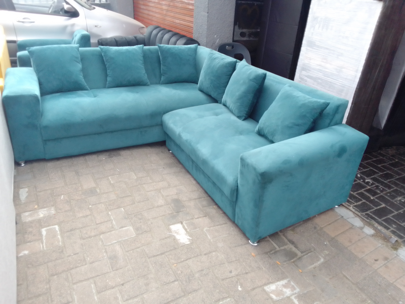 new green L shape couch