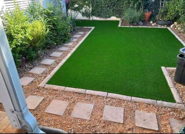 Instant roll on lawn grass// buffalo grass// kikuyu grass// brown decorative stones