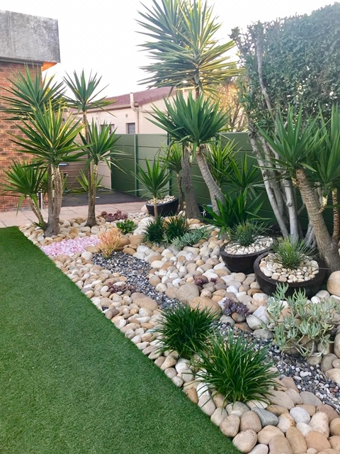 Stone and Bark, your supplier for Boulders, White Marble Chip, Marine Mix and Namib Red Pebbles ....
