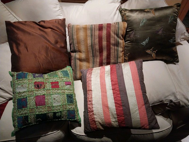 Cushions, 9 of  Various shapes and colours