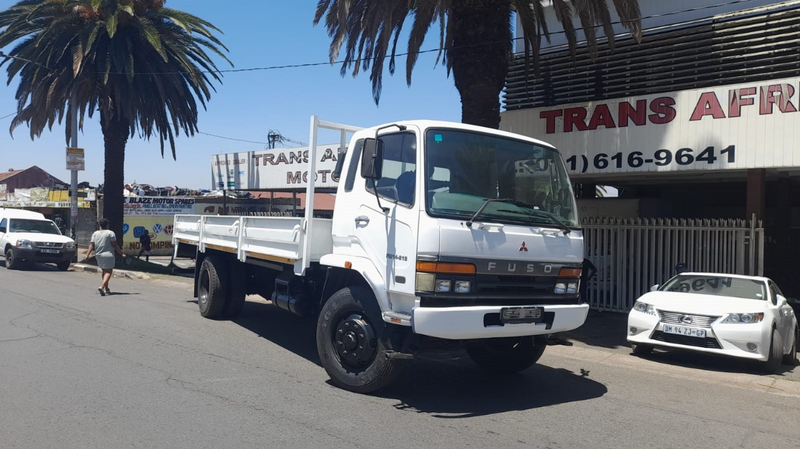 Fuso 14_213 8ton dropside in a mint condition for sale at an affordable amount