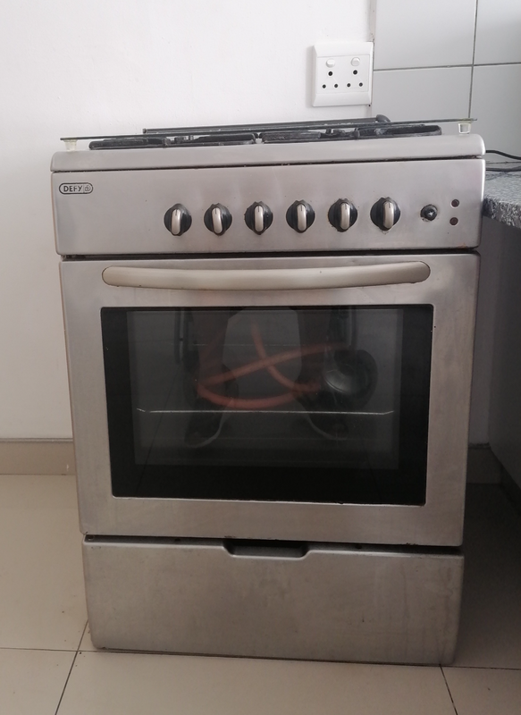 Defy Stainless steel gas stove and electric oven Model number DGS122 for sale