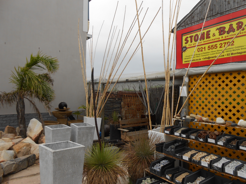 BOULDERS, PLANT POTS, GRAVEL and so much more... Start your landscaping project at Stone &amp; Bark