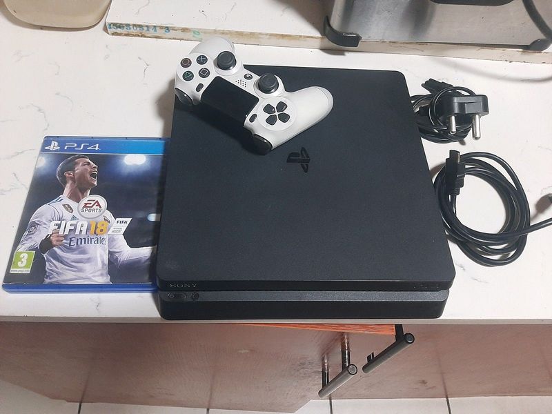 Playstation 4 slim with fifa 18 and Rocket league