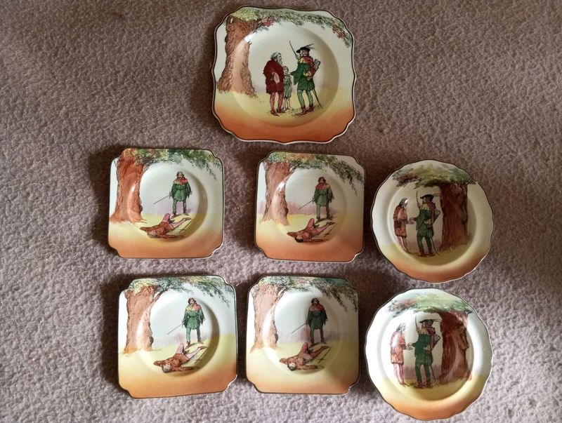 Royal doulton set of 7 plates,  robin hood theme, the friend of the poor under the greenwood tree