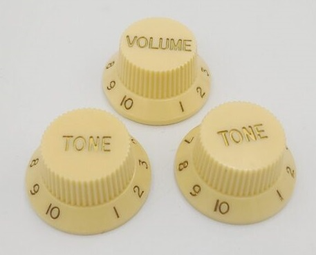 Ivory with Gold Writing Strat style replacement knob set – 1 Volume, 2 tone