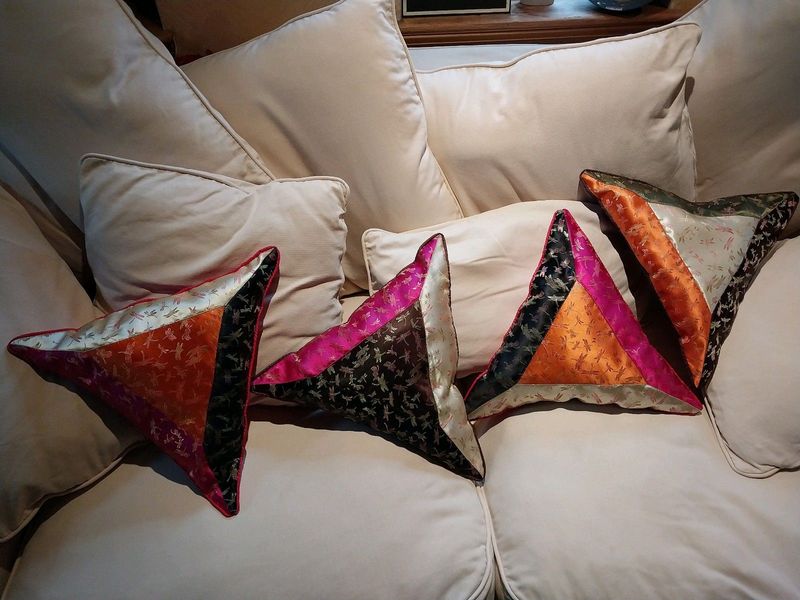 Cushions, Triangular, bright colours, imported from Bali. Total of 4.