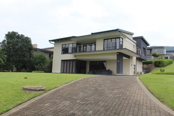 Luxurious 5-Bedroom Home in Sought-After Golf Estate