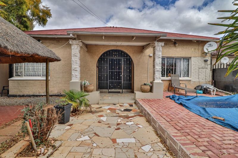 This charming four-bedroom, two-bathroom home is located in Malvern East