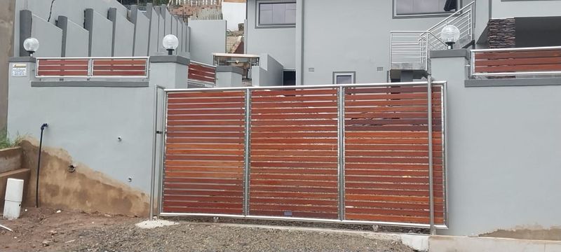 Stainless steel Balustrades,Driveway gates and Fences