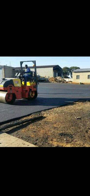 Tar surface and brick paving construction works